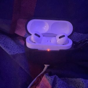 AirPods Pro with case and wireless charger